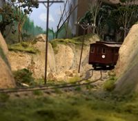 Hills either side of train made by hand